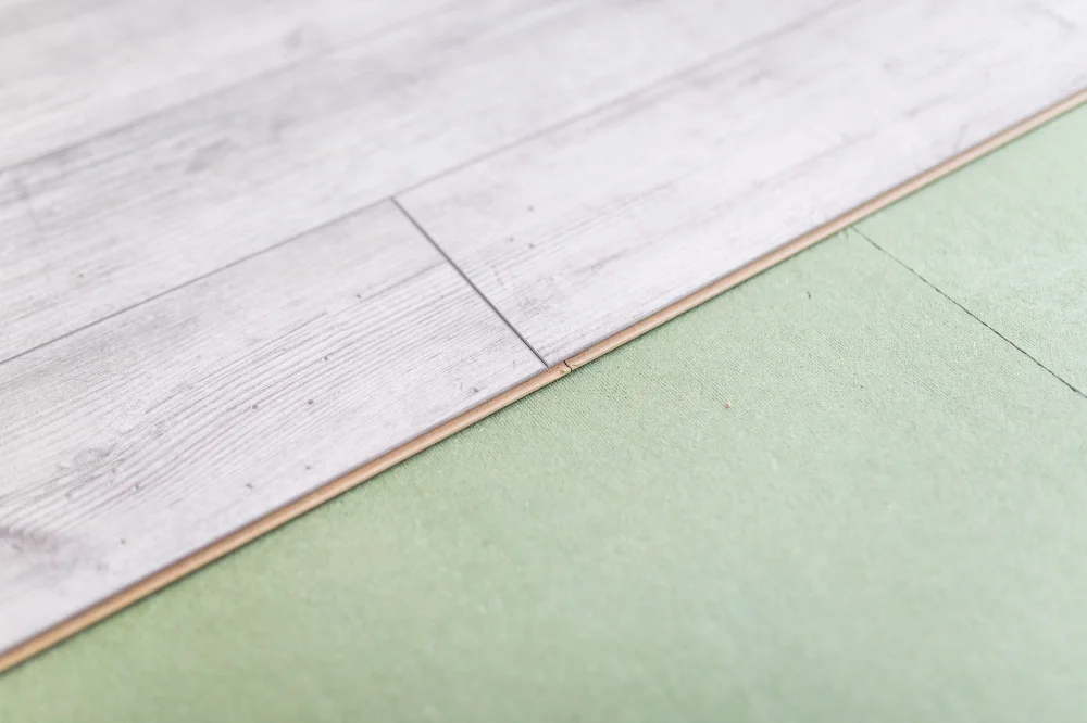 Base aislante para suelo laminado